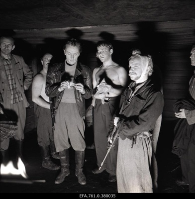 A scene from the film "Metscanners". On the left in the role of Enn Klooren, Sander in the role of Sulev Luik, Reinu in the role of Tõnu Kark, Harri Paate in the role of "Man of the Sander Group"  similar photo