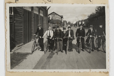 Men with bicycles  similar photo