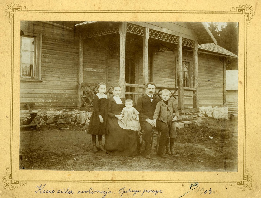 Kuie village schoolhouse and school manager Jaan Jaam with his family in 1903