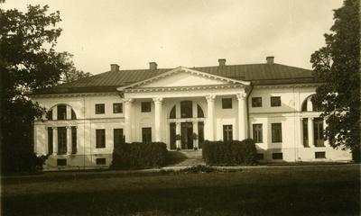 Saku Home Economy School's main building and school cattle in the pasture  duplicate photo