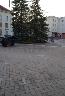 Pioneers V.I. On the foot of Lenin's memorial pillar, place flowers. rephoto