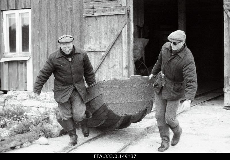 The fishermen of the Prangli Island to fish by boat on the way to the sea.