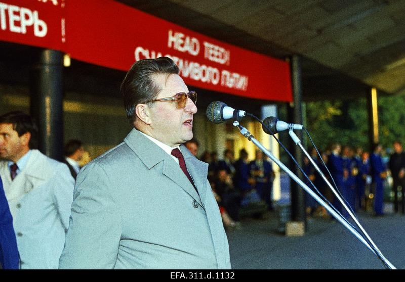 Heino Veldi, Chairman of the Estonian Soviet National Agro-industrial Committee, speaks at the Baltic Station for sending mechanizers and drivers to the North Kazakhstan district.