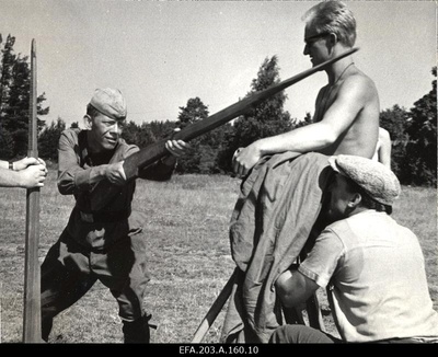 View of the film studio Tallinn Film Studio People in the Soldiers during the performances. On the left actor K. Komissarov.  duplicate photo