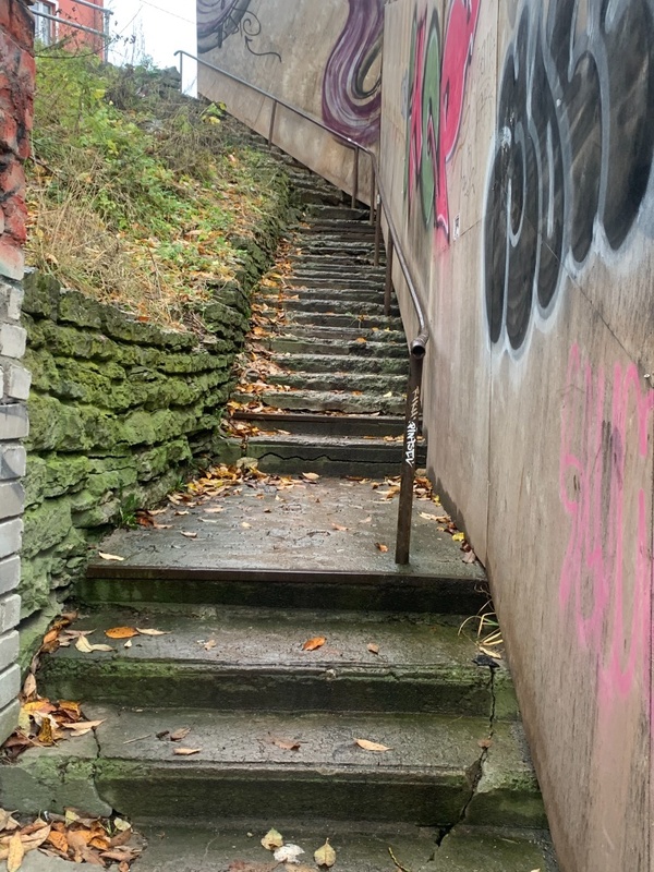 View of the old staircase in the fishing port area. rephoto