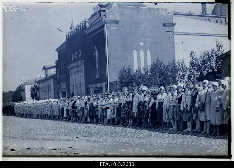 Women's defence allies and women's clothes on parade.