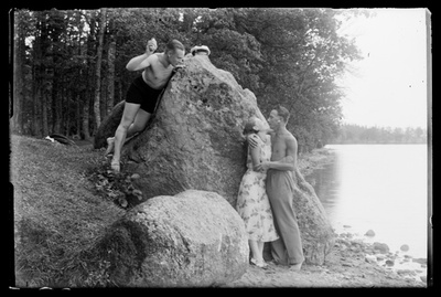 Two young men and Miss Saadjärve ? At the beach, Kalevipoja stone ? At  similar photo