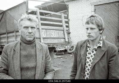 Lihula sovhoosi peaagronoom Sulev Simson and driver Aarne Indres Kirbla in front of the workshop.  similar photo