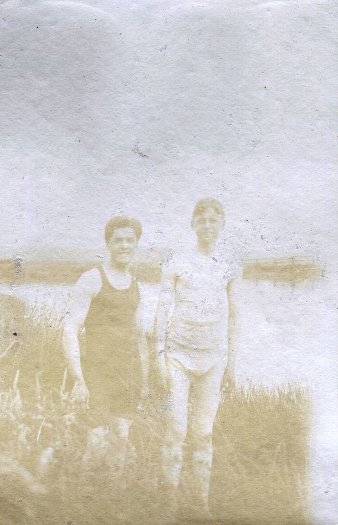 Two males dressed to go for a swim, next to the lake, Farnborough