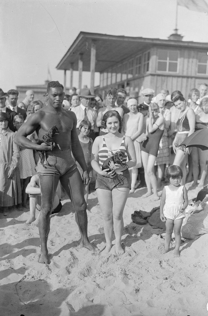 People and two swimming pools on the beach