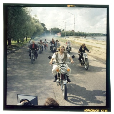 Film extracts. Men drive motorcycles.  similar photo