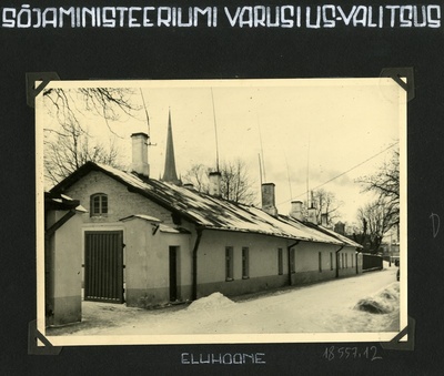 Sõjaministeeriumi Varustusvalitsuse eluhoone Tallinnas. Taustal Oleviste kirik  similar photo