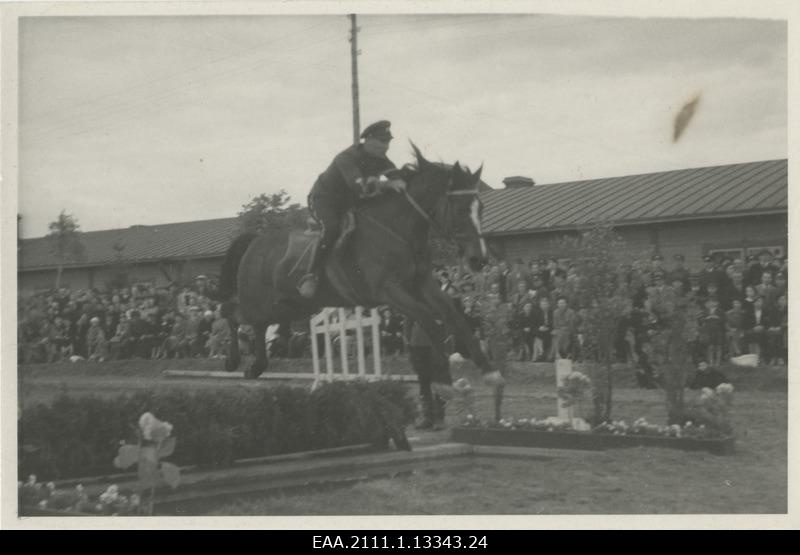 Riding races of the riding regiment Lembitu in the Arms Square, officer overcoming obstacles in competitions
