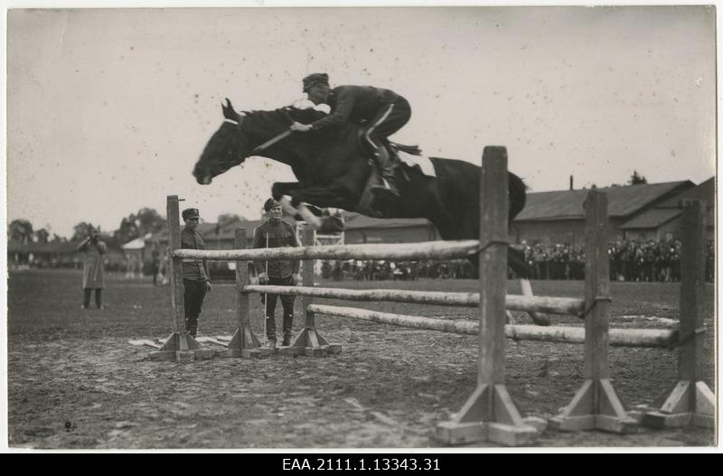 Riding competitions of the riding regiment at Lembitu Arms Square, Lieutenant Eduard Reinmann, who was winner by officers, overcomes the difficult obstacle