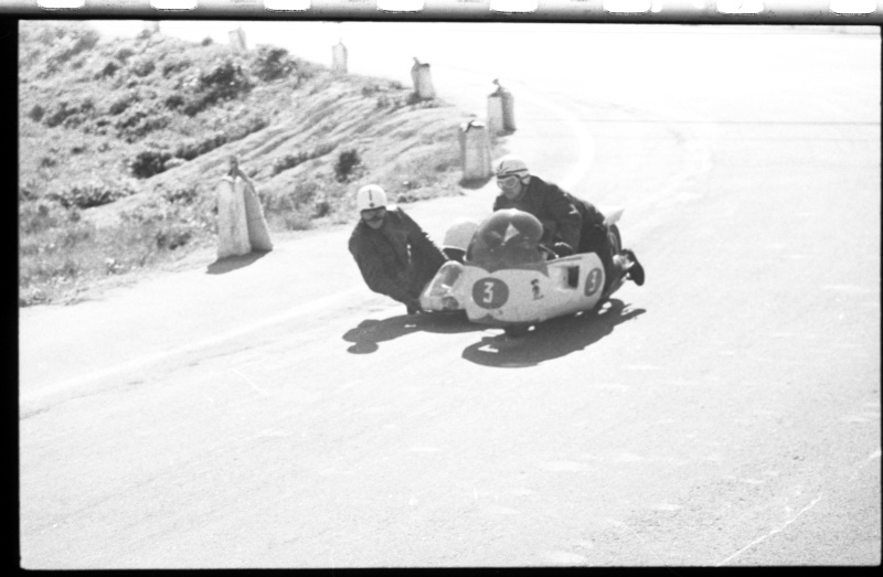 Kalevi Suursõit on the Pirita-Kose-Kloostrimetsa circular track. A motorcycle with side basket on the track in the curve. 1969 Kalev Suursõit. Aarne Kanut - Helmuth Aas.