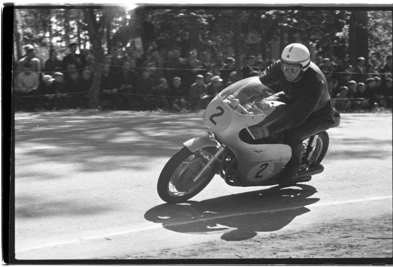 Kalevi Suursõit on the Pirita-Kose-Kloostrimetsa circular track. Motorcycle on the track. 1969 Kalev Suursõit. Endel Kiisa.
