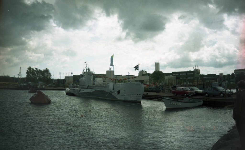 The submarine "Lembit" stands at the Pirital cave in flagships, view by the wall. The ship is in flagships, since 60 years have passed since the ship was thrown into water