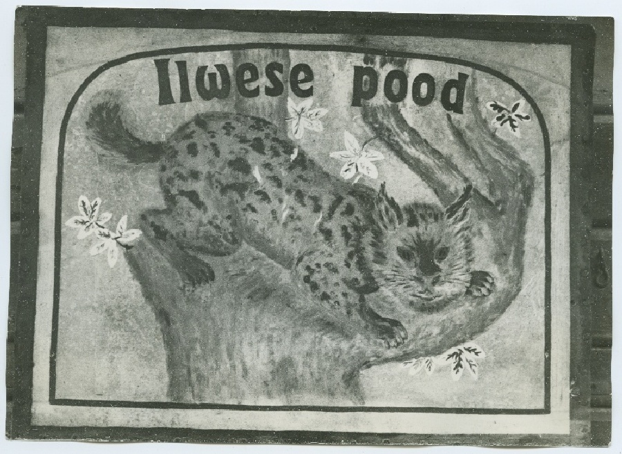Poesilt "Ilvese pood", ilvesega puutüvel.