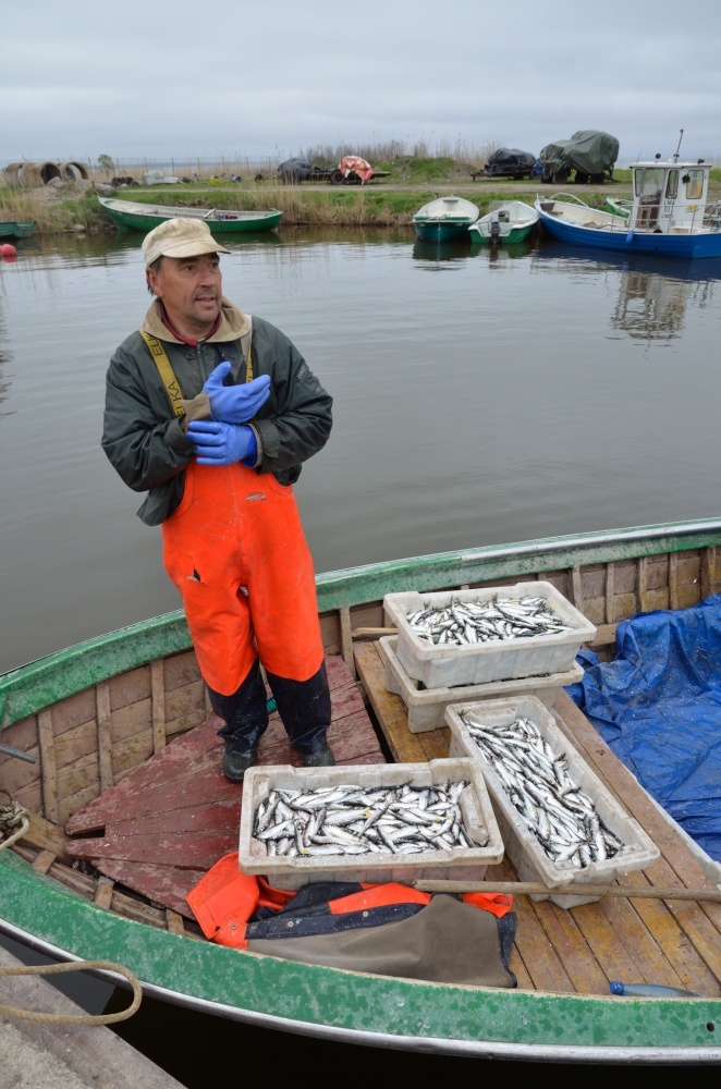 Pärnumaa fisherman in the port of Lindi with grease boxes