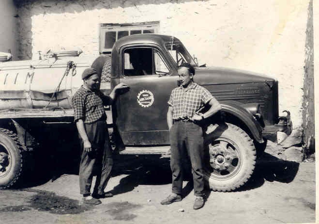 Bringing milk to the tali dairy in 1955.