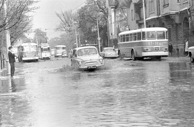 The means of transport driving from the rain flooded on Tallinn Street.