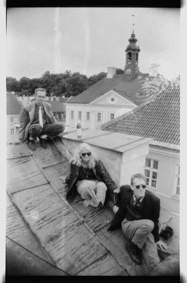 Raivo Raam (over), Õnne Pärl and Sven Karja Raekoja square on the roof of 8 houses  similar photo