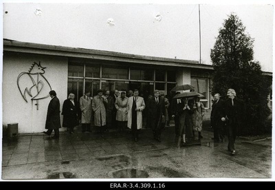 Delegation of the Social Committee of the Finnish Parliament in front of Tallinn Example City Factory  duplicate photo