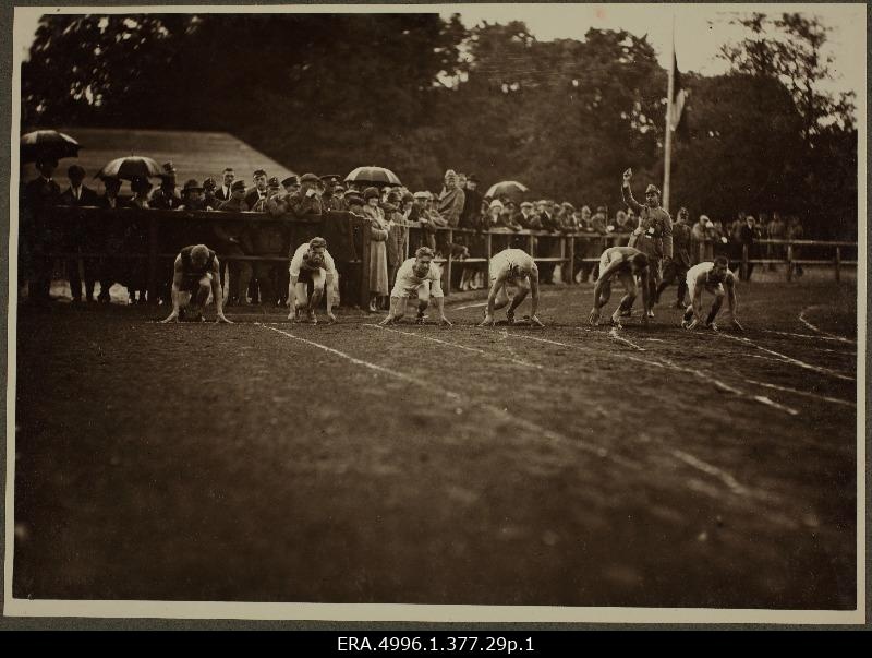 Running competition at Kadrioru Stadium in June 1926. Runners on the start track, viewers with rain shelters. Possible that the opening of the Kadrioru Stadium on June 13, 1926