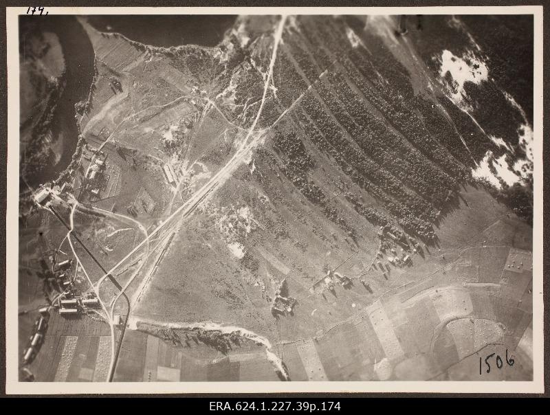 View from air to landscape with buildings and water bodies; photo 1. Number of photo positives in the air force auction