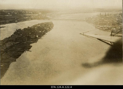 Aerofoto from the River Daugava, the island of Zakusala (Jänese), the railway bridge and the city of Riga [1916].  similar photo