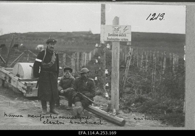 War of Liberty. 1.piir hunting battalion guard post at the electrical wire barrier built during the German occupation on the road to Narva-Jamburg near Narva. The background of the carriage.  duplicate photo