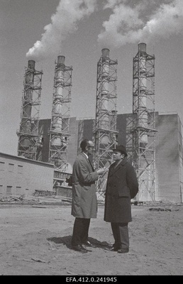 The radio journalist Theophil Source interviews Maardu Chemistry Combination in the background of the partorge.  similar photo