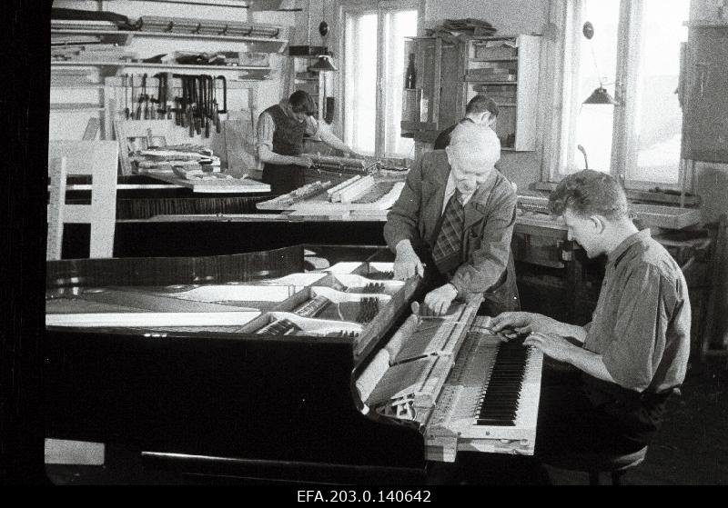 Ernst Hiis, the designer of the Tallinn Klaver factory, is supervised by Eduard Kiviking.