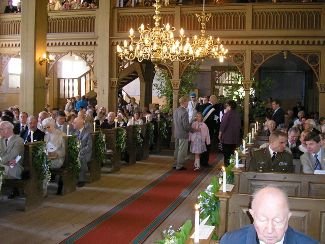 Estonian flag 120. People in the Otepää Church