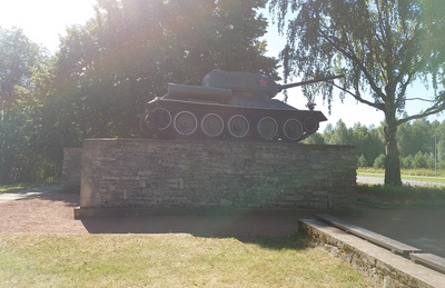Tank T-34 as a monument mark of the Soviet military's defense of Narva in 1944 on the breakthrough of the Narva River rephoto