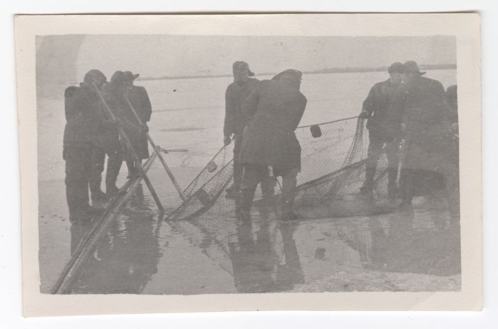 Lovely fishermen in winter fishing