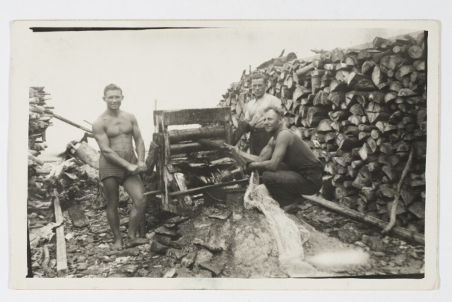 Fishermen at the beach of Toila with nets turning