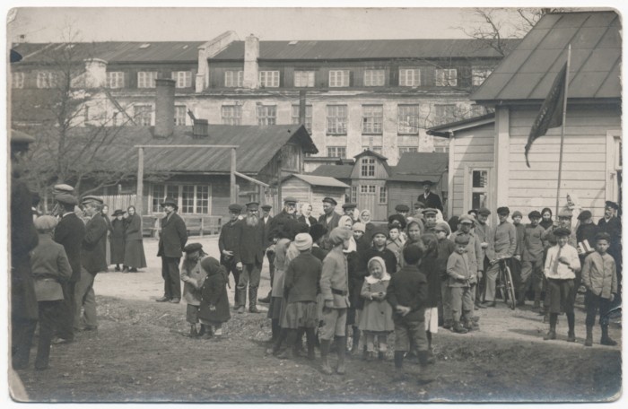 Rear side of Kärdla Cleaning Factory, gathering of people.