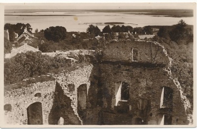 Photo postcard. View of castle walls and Tagalah. 1929.  duplicate photo