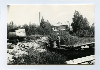 Mechanized Water Construction Colonel Development Master Treil with a companion on the shore of Lake Ülemiste to take fuel for soil pump  duplicate photo