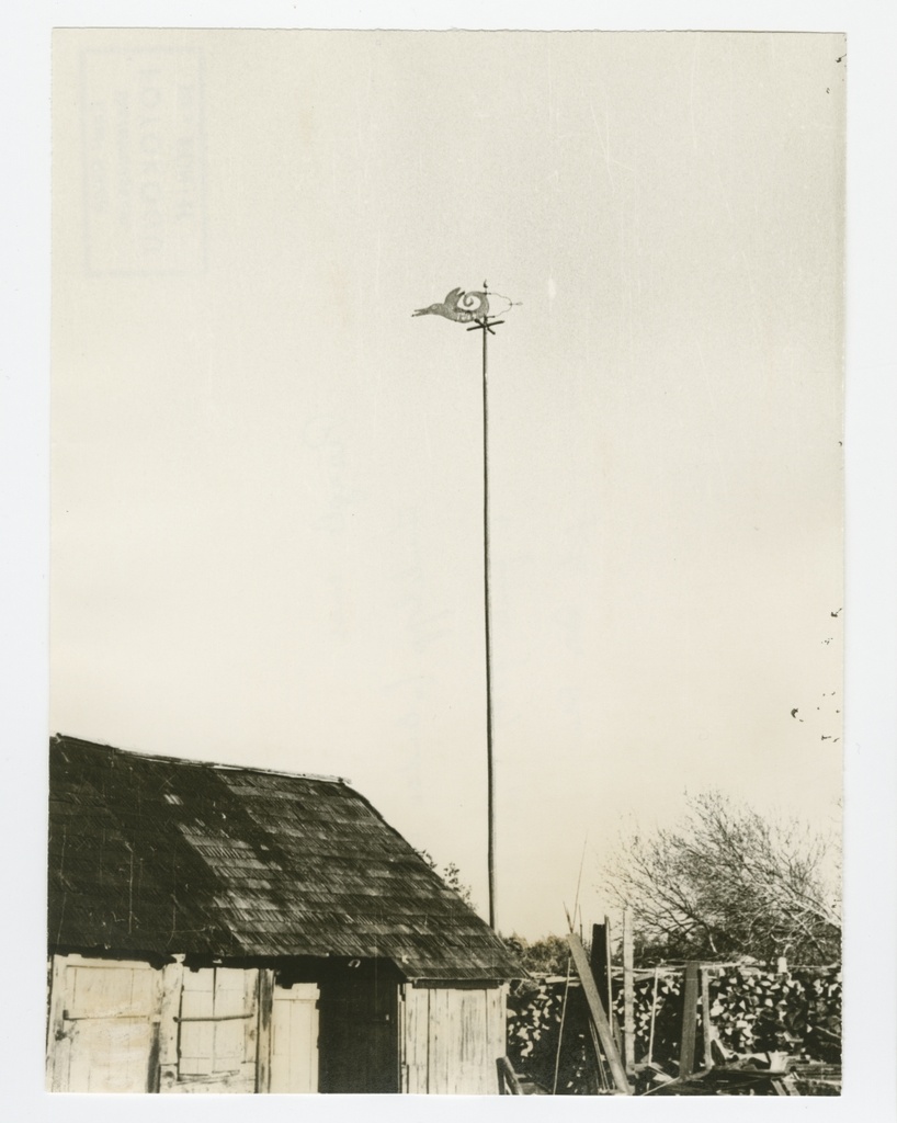 Windmill "fish flying" on the island of Prangli in the house in the courtyard