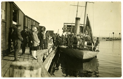 The garden boat "Mardus" in Naissaare harbor, a boiler train and a larger population. A swimming table on the other side of the cave.  duplicate photo