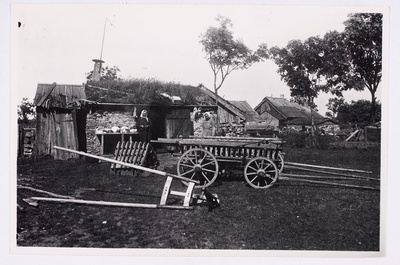 Farm courtyard with agricultural tools in 1933. Noarootsi khk, Rikholdi v, Osmussaar  duplicate photo