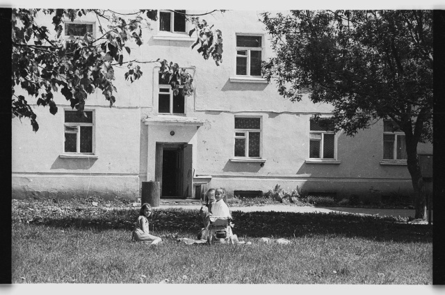 Rock oil girls playing on lawn