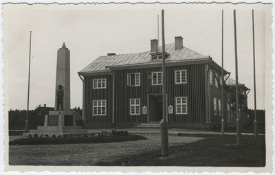 Kohila folk house, the monument of the War of Independence on the left.  duplicate photo