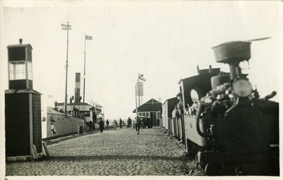 The port of Romassaare, the port cottage sosla locomotive, the ship near the cottage of Estonia  duplicate photo
