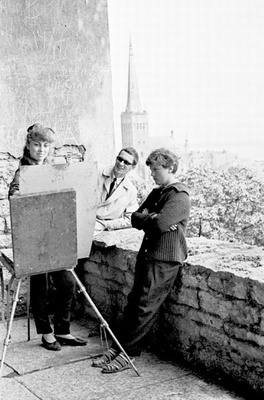 Female artist in Tallinn in Toompea painting.  similar photo