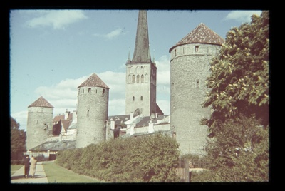 Tower square towards the church of Oleviste. Three city wall towers, the tower of the Oleviste Church.  duplicate photo