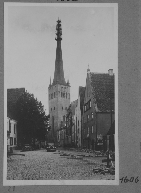 Wide street with the church of Oleviste - church tower in orders