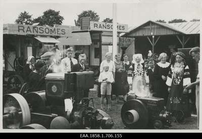 People in "Ransomes" watching the exhibition at the 50th anniversary exhibition of the Estonian Farmers' Society in Tartu  duplicate photo